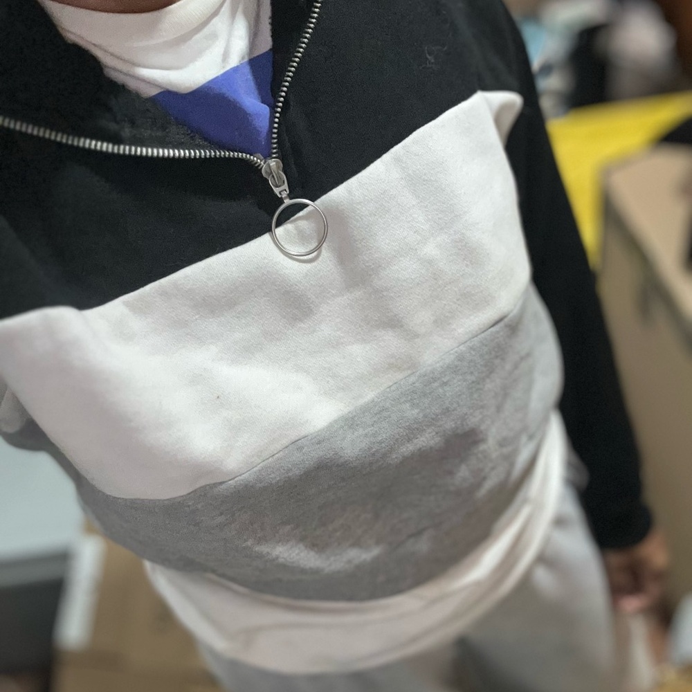 Stylish Black, White, and Gray Zip-Up Sweater size S
